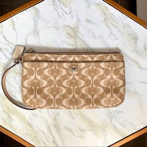 Coach monogram wristlet tan and cream